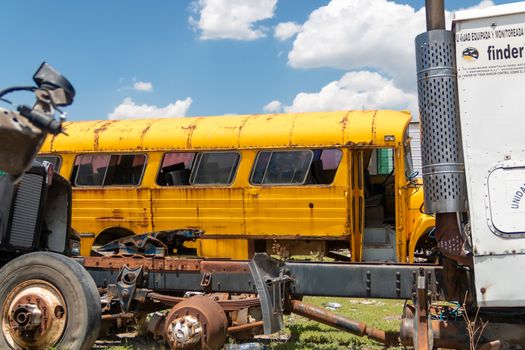 Old damaged cars on the junkyard waiting for recycling in Mexico City. Mexico