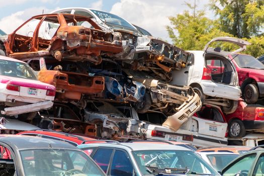 Old damaged cars on the junkyard waiting for recycling in Mexico City. Mexico