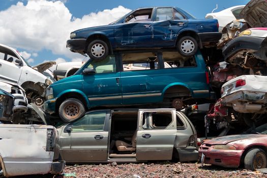 Old damaged cars on the junkyard waiting for recycling in Mexico City. Mexico