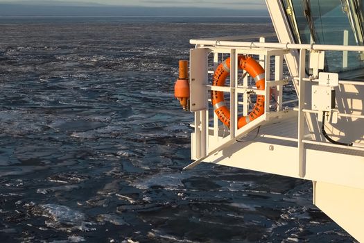 The feed of a ship sailing in the Arctic. Landscape of the Arctic from the deck of the tanker.