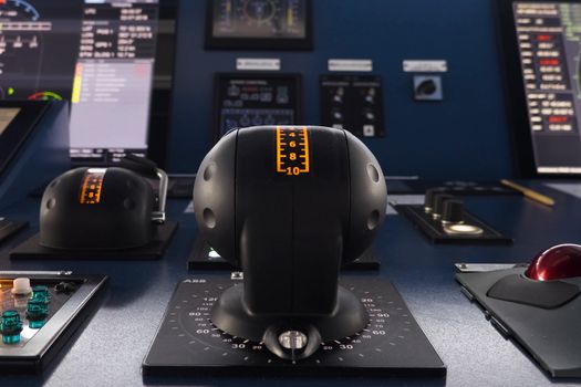 Ship control panel. a Navigational devices and echolocation and radar monitors.