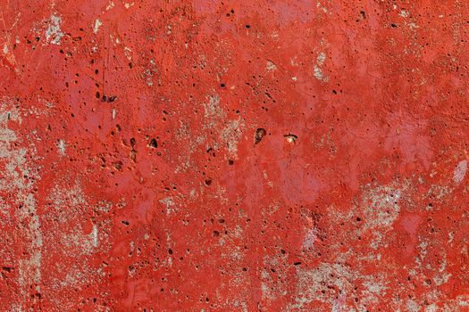 monocolor orange painted flat concrete surface closeup texture.