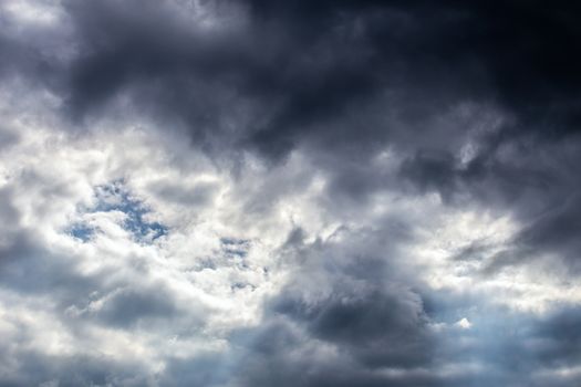 incoming storm close-up cloudscape at march daylight in continental europe.