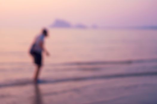 Tropical nature clean beach and white sand in summer with sun light blue sky and bokeh abstract  background.