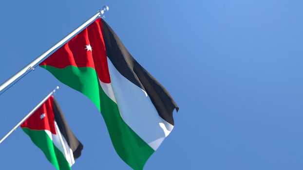 3D rendering of the national flag of Jordan waving in the wind against a blue sky