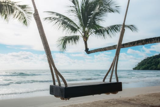 Swing on beach at sea in the summer.