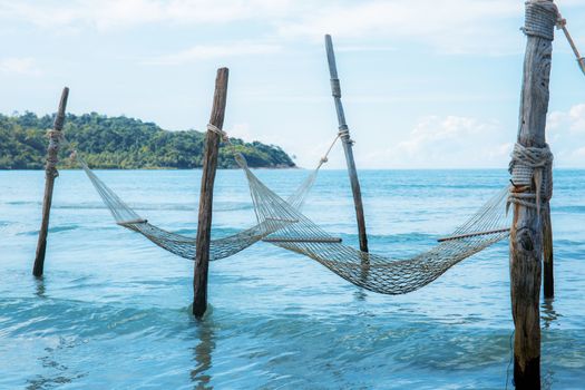 Cot for relaxing at the sea with freshness of nature.