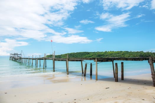 Wooden bridge on beach at the sea with freshness of nature.