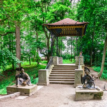 Bila Tserkva, Ukraine 06.20.2020. Chinese bridge in the Alexandria park, one of the most beautiful and famous arboretums in Ukraine, on a cloudy summer day.