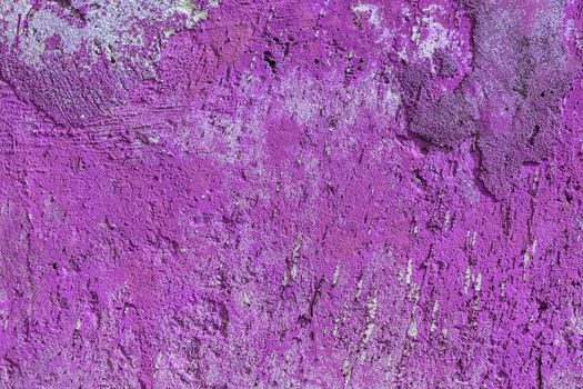 monocolor pink painted flat concrete surface closeup texture.