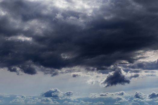 incoming storm close-up cloudscape at march daylight in continental europe.