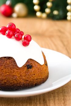 Christmas pudding on wooden table