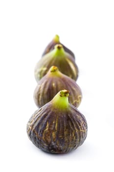 Fresh figs isolated on white background