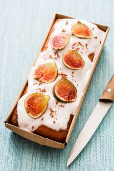 Delicious fig cake on blue background