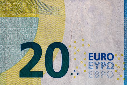 Selective focus on detail of euro banknotes. Close up macro detail of money banknotes, 20 euro isolated. World money concept, inflation and economy concept