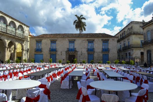 Havana, Cuba, February 2011: city square prepared for festivities, empty chairs and tables; ready to receive people