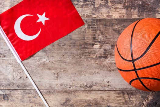 Basketball and Turkey flag on wooden table