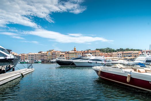 Saint-Tropez and its fishing port and its yachts in summer in France