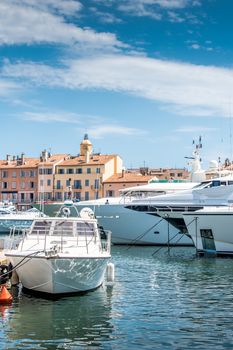 Saint-Tropez and its fishing port and its yachts in summer in France