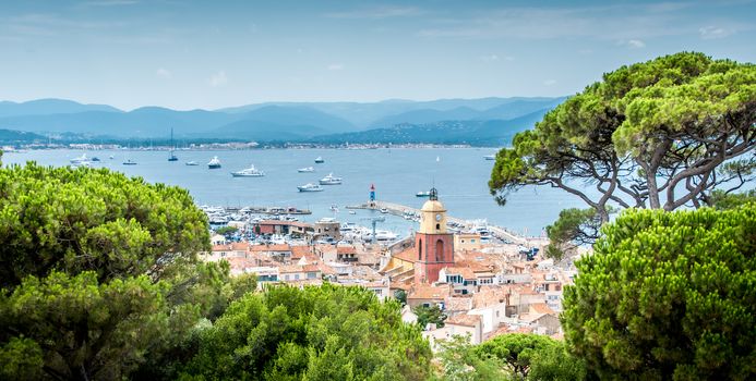 Saint-Tropez and its fishing port and its yachts in summer in France