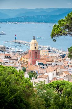 Saint-Tropez and its fishing port and its yachts in summer in France