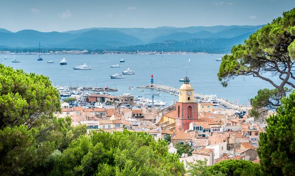 Saint-Tropez and its fishing port and its yachts in summer in France