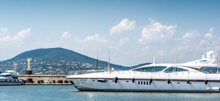 Saint-Tropez and its fishing port and its yachts in summer in France