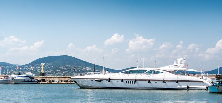 Saint-Tropez and its fishing port and its yachts in summer in France