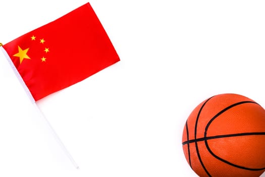 Basketball and Chinese flag on white background.Top view. Copyspace