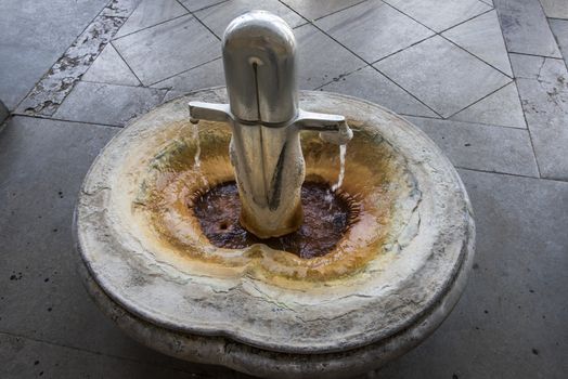 Hot mineral spring in Mill colonnade (Mlynska kolonada) in Karlovy Vary spa, Czech Republic