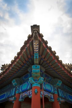 Traditional Chinese building under blue sky closeup