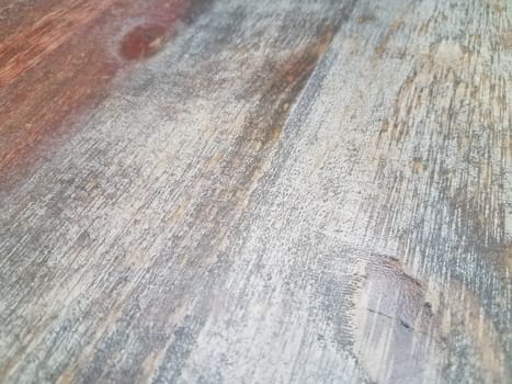 worn and faded brown and grey wood table or surface