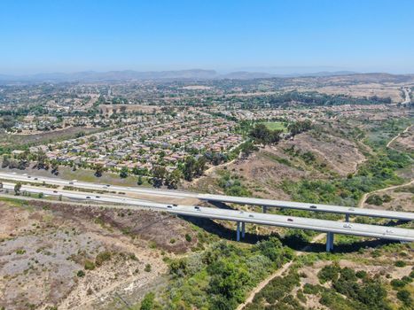 Aerial view of highway, freeway road with vehicle in movement in San Diego, California, USA.
