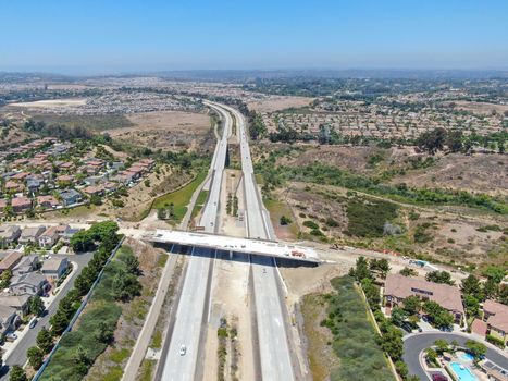 Aerial view of highway, freeway road with vehicle in movement in San Diego, California, USA.