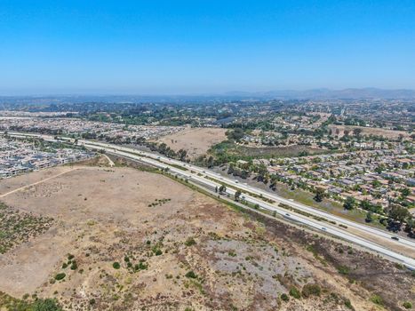 Aerial view of highway, freeway road with vehicle in movement in San Diego, California, USA.