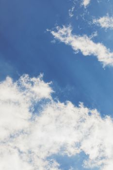 Blue sky background with white clouds photo