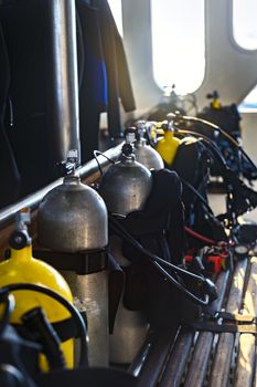 Scuba gear on the boat drying closeup photo