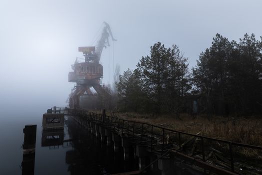 Rusty old industrial dock cranes at Chernobyl Dock