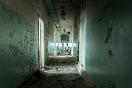 Abandoned corridor in Pripyat Hospital, Chernobyl Exclusion Zone 2019 angle shot