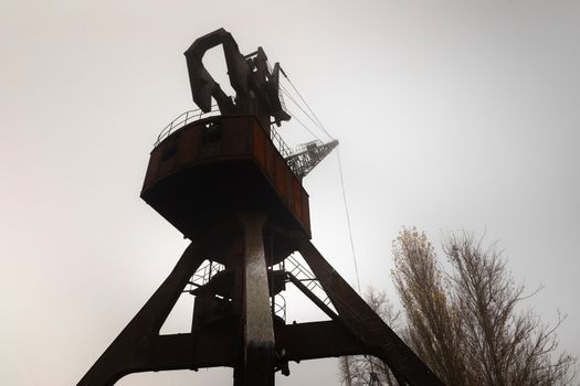 Rusty old industrial dock cranes at Chernobyl Dock