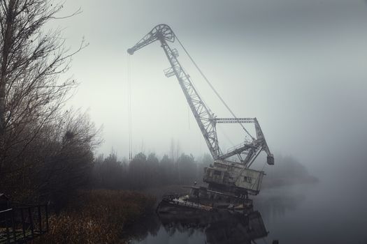 Rusty old industrial dock cranes at Chernobyl Dock