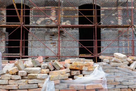 Close up photo of construction site with bricks