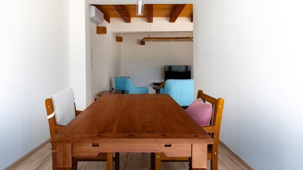 Dining table in large modern apartment angle shot