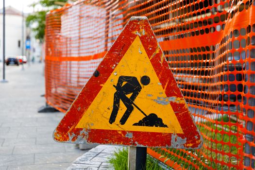 Construction sign ready to slow traffic closeup photo