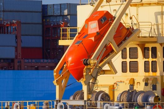 Large industrial port with many cranes and cargo containers