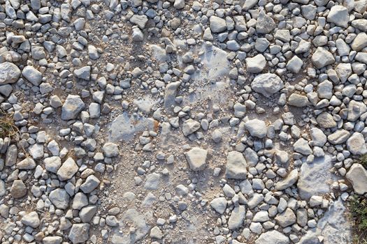 Rough stone surface as background texture closeup photo