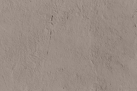 flat creamy peach color plaster wall matte texture.