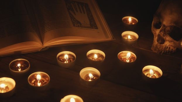 Altar with magical grimoire close up photo