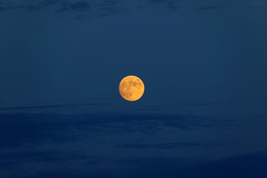 Glowing moon on night sky closeup photo
