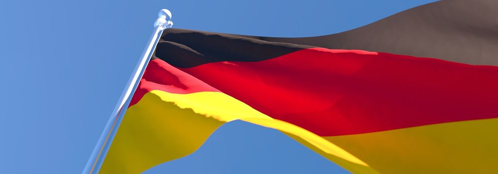 3D rendering of the national flag of Germany waving in the wind against a blue sky